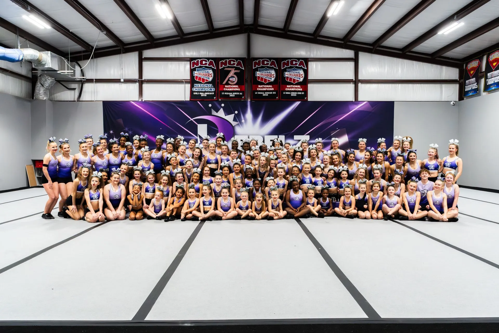 Rebelz Cheer athletes gathered inside the gym for the 2026-2027 season